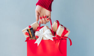 Christmas shopping bag full of presents