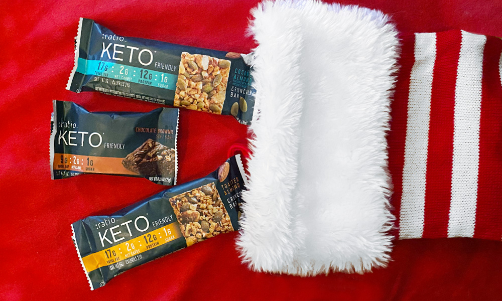 :ratio keto bars falling out of a Christmas stocking